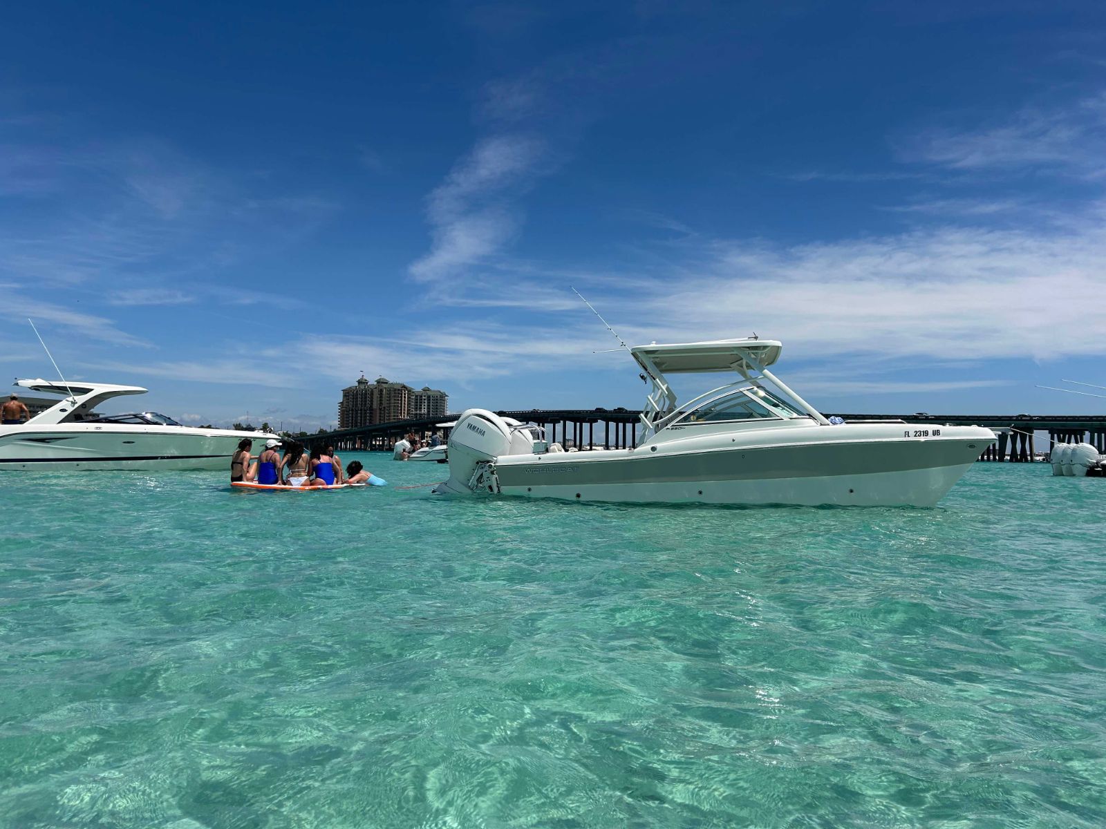 Crab Island crystal-clear water with floats