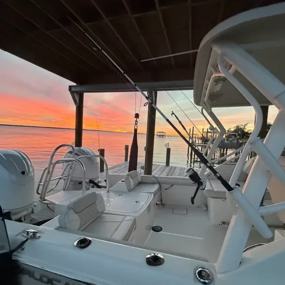 Fishing boat docked at sunset